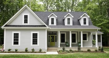Siding installation on a Cape Cod home